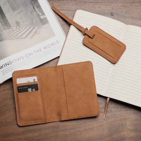 A luggage tag to mark your belongings, perfect for business trips and vacations. With its sleek design and convenient loop, it easily attaches to all types of luggage. The tag includes a discreet address label where you can fill in your name and contact details, making it easy to identify your luggage with both style and security. Certified by RCS (Recycled Claim Standard), RCS certification guarantees that the entire supply chain of recycled materials is certified. The total recycled content is based on the overall product weight. This product contains 30% RCS certified recycled polyester and 13% RCS certified recycled PU.