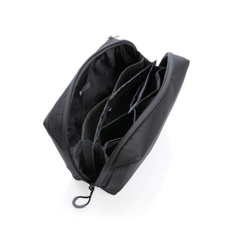 Whether for storing cables, everyday gear, or travel essentials, this tech pouch offers perfect organisation and ease of access. Origami-style pockets create enormous spatial efficiency, letting you pack more into a smaller space while keeping your items neatly organised and easy to find. Elastic accessory loops keep items like pens always within reach. Exterior handles and a clamshell-style opening makes this pouch easy to access. External zip pocket has a cable pass-through for easy device charging. PVC free. Each tech pouch has reused 8.5 PET bottles. 2% of proceeds of each Aware™ product sold will be donated to Water.org.<br /><br />PVC free: true