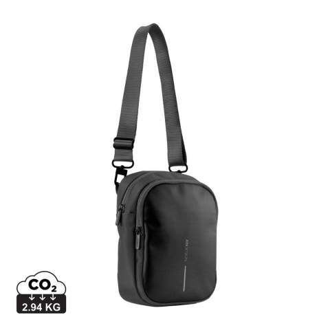 The Boxy Sling is a versatile cross body bag, designed to carry everyday essentials. The pack can be worn around the neck, over the shoulder or around the waist. It has enough capacity to hold a cellphone, wallet or purse, passport, notebook and various other small items. The hidden rear pocket is perfect for discreetly storing cash, cards or other valuable items. The Boxy Sling has a unique hidden water bottle pocket that can stay tucked away when not in use. Made from R-pet fabric with the AWARE™ tracer. With AWARE™, the use of genuine recycled fabric is guaranteed. 27% recycled content.<br /><br />PVC free: true