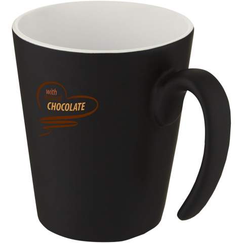Ceramic mug with a modern design and matt finish featuring a shiny interior with a colour-pop effect. Volume capacity is 360 ml. Dishwasher safe for all printing methods. Presented in a recycled cardboard gift box.