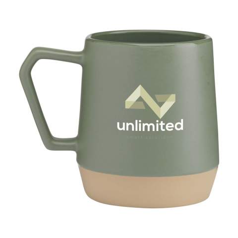 Mug with a handle, made from high-quality ceramic and 5% recycled ceramic. The inside has a high-gloss finish. The bottom section of the mug is unglazed and shows the natural, unprocessed ceramic. Natural clay variations give this mug a unique character. Dishwasher-safe. Capacity 330 ml. NOTE: The white mug cannot be laser engraved because it is not sufficiently visible.    Recycled ceramic mugs are manufactured by mixing raw materials with fragments of broken or unusable mugs collected in the same factory. These discarded components are finely ground into powder and then mixed with essential substances such as kaolin and quartz before being converted into new ceramic products. The final product usually consists of 5% to 10% recycled ceramics to ensure optimal quality. The use of recycled ceramics promotes the circular economy and reduces the need for new raw materials.