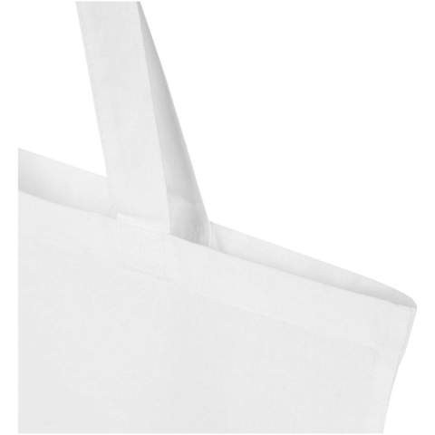 Die Madras Blend Tragetasche aus 60 % GRS-zertifizierter recycelter Baumwolle und 40 % GRS-RPET ist das perfekte Giveaway bei Veranstaltungen, Konferenzen oder als Einkaufstasche für kleine Einkäufe. Die Baumwolldichte von 140 g/m² Baumwolle macht die Tasche robust, langlebig und geeignet, um schwere Gegenstände im Hauptfach zu transportieren. Mit den 30 cm langen Schultergriffen lässt sich diese Tragetasche leicht transportieren. Die für diese Tasche verfügbaren Druckverfahren sind ebenfalls GRS-zertifiziert, sodass die gesamte Lieferkette transparent und zertifiziert ist. Hergestellt in Indien. Beständigkeit bis zu 5 kg. Fassungsvermögen: 7 Liter.