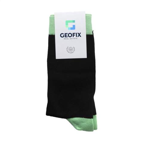 Comfortable socks from the Kingly brand. These durable, high-quality socks are made from premium upcycled yarn sourced from textile waste materials and consist of a blend of 85% upcycled cotton, 12% regenerated polyamide from post-consumer material and 3% elastane. They have a snug, comfortable fit and reinforced heel and toe areas for a longer life.    The socks can be personalised with a knitted, customised design in up to 6 colours. Choose from 6 yarn colours of upcycled cotton and 50 colours of regenerated polyamide. Each pair is packed with a recycled label that can be printed with your own full-colour design - creating socks that perfectly match your brand identity.    Available sizes: M (36-39) and L (40-46). Minimum order quantity: 50 pairs per size and per design.    OEKO-TEX and GRS-certified. Made in Europe.