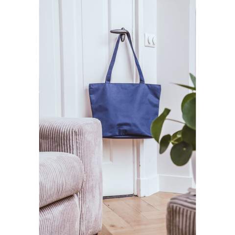 Beautiful, rugged bag made of 600D polyester with strengthened interior, long handles, zipper and storage pouch with a zipper. The broad bottom has a beautiful and sleek finish with round piping. Multipurpose use as a shopper, shopping bag and beach bag.