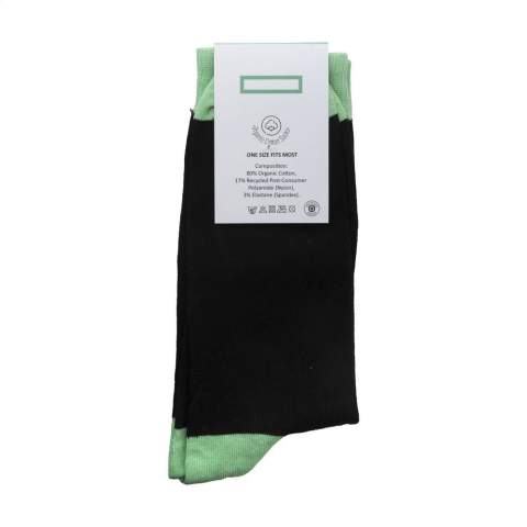 Comfortable socks from the Kingly brand. These durable, high-quality socks are made from premium upcycled yarn sourced from textile waste materials and consist of a blend of 85% upcycled cotton, 12% regenerated polyamide from post-consumer material and 3% elastane. They have a snug, comfortable fit and reinforced heel and toe areas for a longer life.    The socks can be personalised with a knitted, customised design in up to 6 colours. Choose from 6 yarn colours of upcycled cotton and 50 colours of regenerated polyamide. Each pair is packed with a recycled label that can be printed with your own full-colour design - creating socks that perfectly match your brand identity.    Available sizes: M (36-39) and L (40-46). Minimum order quantity: 50 pairs per size and per design.    OEKO-TEX and GRS-certified. Made in Europe.
