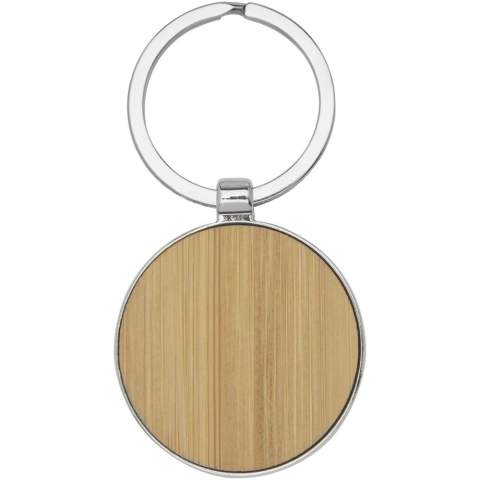 Premium quality round keychain made of bamboo with zinc alloy metal casing, supplied into a brown recycled Kraft paper envelope. The diameter of the keychain is 4 cm. Made for laser engraving. 