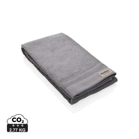 These spa-quality sustainable bath towels of 500 grams are delightfully thick, silky, and super soft to your skin. The luxurious Ukiyo towels are ultra-soft, quick-drying, and offer great absorbency.  This towel contains 30% recycled cotton and is super soft and silky to the touch. With AWARE™ tracer that validates the genuine use of recycled cotton. 2% of proceeds of each Impact product sold will be donated to Water.org. Machine washable. Made in Portugal.