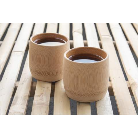 WoW! Reusable cup made from 100% natural bamboo. Contains no additional materials. Can be used for tea and coffee, but also great as a bowl for snacks. The cup is made by hand from a bamboo stem making each one unique. The size as also the capacity varies (between 170 and 210 ml) with each cup. Material: Bamboo is a fast growing plant with wood specifications. It grows to maturity in 5 years versus 30 - 120 years for wood. After a bamboo plant is harvested, four to seven new plants grow from the roots. No replanting necessary, just made possible by nature. Bamboo is known for its hard surface, which makes it a robust and durable material.  The Bamboo Cup is made of 100% natural bamboo and contains no additional ingredients. 100% food safe.  Not dishwasher safe. Each item is supplied in an individual brown cardboard box.