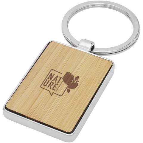 Premium quality rectangular keychain made of bamboo with zinc alloy metal casing, supplied into a brown recycled Kraft paper envelope. The size of the keychain is 5 x 3 cm. Made for laser engraving. 