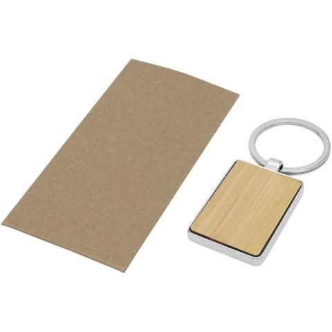 Premium quality rectangular keychain made of bamboo with zinc alloy metal casing, supplied into a brown recycled Kraft paper envelope. The size of the keychain is 5 x 3 cm. Made for laser engraving. 