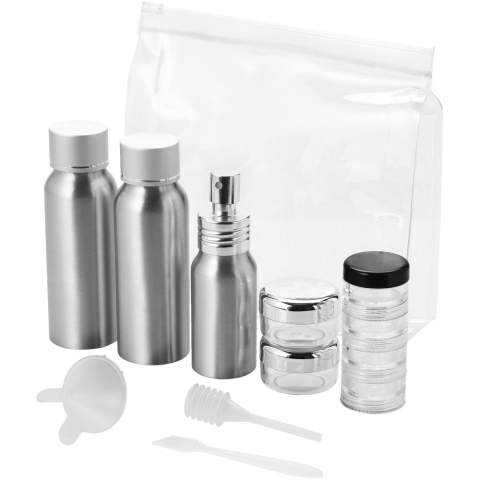 Cette trousse de toilette contient 2 bouteilles en aluminium 80ml, un vaporisateur 30 ml, deux petits pots, un pot avec 4 logements, une spatule, un entonnoir et une poire. Les bouteilles et l'entonnoir, etc. sont emballés dans une pochette plastique, séparés de la pochette. Marquage indisponible sur les composants.