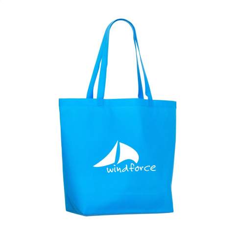 Large, non-woven shopping and beach bag (80 g/m²) with long handles. Broad model. Strong and light.