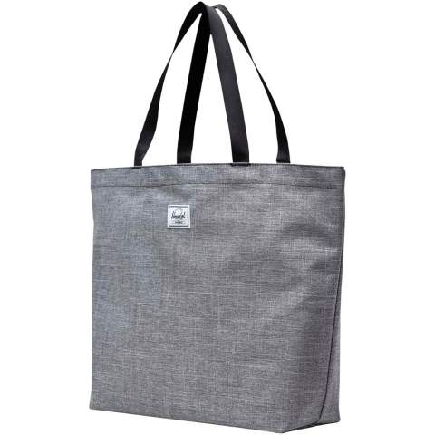 Simple design, recycled materials — this utilitarian hero is your do-it-all tote bag. The bag is crafted from EcoSystem™ 600D fabric and liner, both made from 100% recycled post-consumer water bottles. The tote bag has a metal snap closure and smooth webbing top-carrying handles for ultimate comfort. 