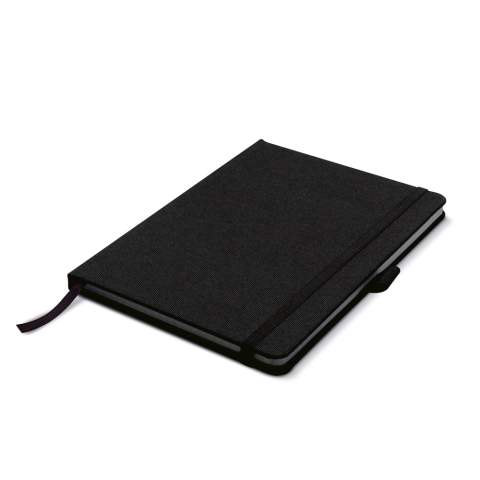 Hardcover A5 note book made of R-PET. This stylish and sustainable notebook comes with an elastic penloop and strap. The 160 checkered pages are made of reycled paper.
