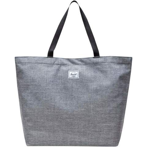 Simple design, recycled materials — this utilitarian hero is your do-it-all tote bag. The bag is crafted from EcoSystem™ 600D fabric and liner, both made from 100% recycled post-consumer water bottles. The tote bag has a metal snap closure and smooth webbing top-carrying handles for ultimate comfort. 