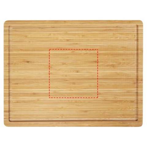 Bamboo steak cutting board with a groove around the perimeter to prevent any liquid from spilling all over the counter. The cutting board is made of bamboo that is sourced and produced following sustainable standards.