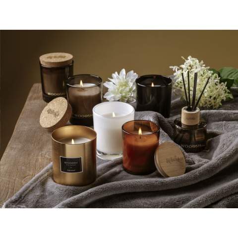 Decorative Wooosh Musk Peach scented candle cast into a beautifully polished glass jar with a bamboo lid. This candle spreads a unique scent that brings you Arabian notes. The scented candle is made from eco-friendly soy wax with 5% aromatic fragrance oil. As soon as the wick is lit and the wax melts, you can smell the powerful scent of pure musk mixed with the fresh sweet scent of peach.  A pleasant harmony of warm balance and sweet softness. This intense scent fits in a romantic and intimate setting. With 12 burning hours, this luxurious scented candle fits into any room of your home.  When you light the candle for the first time, let the top layer of wax melt completely. This ensures an even burn and the best possible fragrance experience. The perfect gift for any occasion. Each item is supplied in a luxurious Wooosh gift box.