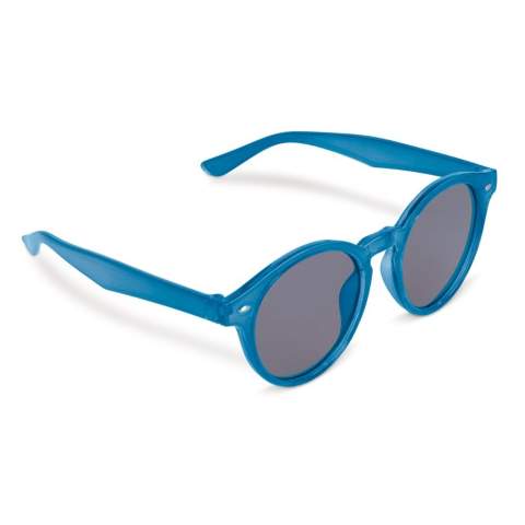 Lunettes de soleil fantaisie Jacky avec monture transparente et verres sombres. Les lentilles ont un filtre UV400.