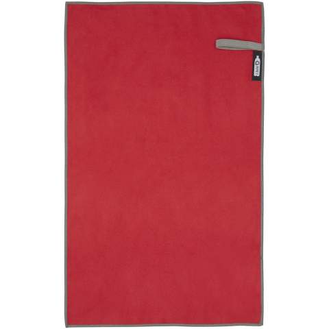 The Pieter sport towel absorbs very well, is lightweight, dries quickly, and the fabric is durable and extremely soft. When the towel is folded and secured with the elastic band it's reduced to a small size, making it suitable for bringing to the gym, swimming pool, or for when going backpacking or camping. The towel has a size of 50 x 30 cm and is made from 90% GRS recycled polyester and 10% nylon, and can be washed in the washing machine at 40 °C. Delivered with a storage pouch (15.5 x 10 cm) made from recycled PET plastic, which provides a great area for printing a logo.