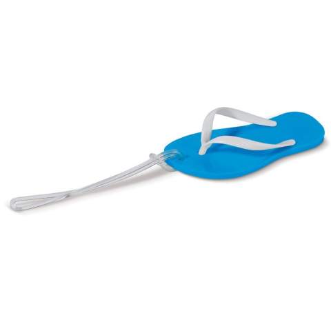 Luggage tag in the shape of a slipper. With this luggage tag you can already visualize your holiday destination. Another advantage of this luggage tag is that, due to its unique shape, your luggage is easily recognizable.