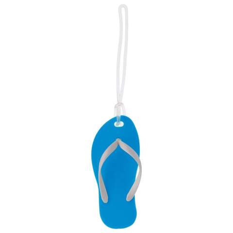 Luggage tag in the shape of a slipper. With this luggage tag you can already visualize your holiday destination. Another advantage of this luggage tag is that, due to its unique shape, your luggage is easily recognizable.