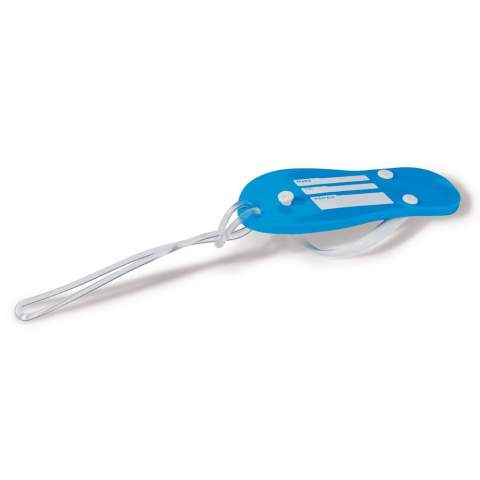 Luggage tag in the shape of a slipper. With this luggage tag you can already visualize your holiday destination. Another advantage of this luggage tag is that, due to its unique shape, your luggage is easily recognizable.