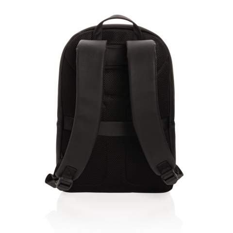 Take your commuting style up a notch with this structured backpack made with soft PU in a clean and sleek style with tonal zippers. The backpack features a top zip closure, top carrying handle, adjustable shoulder straps, external zip pocket, interior zip pocket, luggage strap and a 15.6 inch laptop pocket. Exterior 100% PU, interior 100% 210D polyester. PVC free.<br /><br />FitsLaptopTabletSizeInches: 15.6<br />PVC free: true