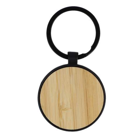 Organisez vos clés avec style grâce à notre porte-clés en bambou et métal de forme circulaire. 