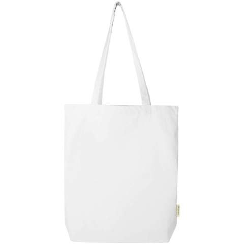 Made from 100% certified organic cotton of 270 g/m², the Orissa tote bag with a wide bottom and long handles ensures a more responsible and durable choice for your everyday needs. With its wide bottom design, it provides additional space for your essentials for any occasion, from shopping trips to casual outings. Volume capacity: 10 litres.