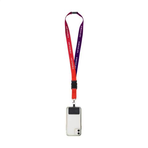 Lanyard of strong woven RPET polyester (made from recycled PET bottles). Supplied with a metal carabiner, a universal patch and a plastic safety lock. The lower part can be disconnected by means of a plastic buckle.  The patch makes it possible to attach your smartphone to your lanyard. With this combination, you can carry your smartphone safely around your neck. This ensures that you have your phone quickly at hand and you can keep your hands and clothing pockets free. This patch is compatible with most smartphone and case combinations, but not with cases with an open bottom. The system is designed so that your phone's charging port is not blocked, even when attached to the lanyard.  Including full-colour sublimation print on the lanyard. Made in Europe.