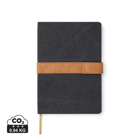 Take notes in style with our A5 notebook, featuring a recycled canvas cover with a convenient PU-band and magnet closure. The notebook contains 80 sheets of 80 gsm recycled inner paper with lined printing, making it perfect for all your note-taking needs. Made from 75% RCS (Recycled Claim Standard) certified recycled materials, the notebook is a responsible choice. The RCS certification ensures a fully certified supply chain of the recycled materials used, emphasising our commitment to responsible sourcing. The total recycled content of the notebook is based on its total weight.<br /><br />NotebookFormat: A5<br />NumberOfPages: 80<br />PaperRulingLayout: Lined pages
