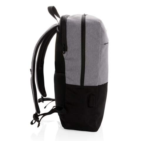 Carry all of your gear for work or travel inside this sleek laptop backpack. The laptop backpack is made from durable fabric and features a sporty, urban inspired design. This backpack includes a fully padded 15.6" laptop compartment and a front pocket to hold all your everyday accessories. The integrated USB port ensures that you are able to charge your phone while on the go. PVC free.<br /><br />FitsLaptopTabletSizeInches: 15.6<br />PVC free: true