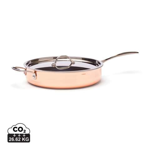 Exclusive tri-ply copper sauté pan with lid. The first layer is the copper exterior and the interior consists of a layer of aluminium and a layer of stainless steel, which make it easy to clean. The copper and aluminium layers conduct heat well, allowing the pan to heat up quickly and evenly. The base has been reinforced with a thicker stainless steel plate which allows for use on an induction hob. The pan has a stainless steel handle that stays cool during cooking. Suitable for all types of hobs.