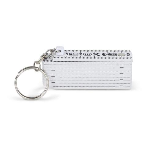 Porte-clés mètre pliant compact d'une longueur totale dépliée de 0,5 m. Calibrée pour des mesures précises, elle est parfaite pour les tâches rapides en déplacement. Elle se plie facilement pour être rangée et transportée.