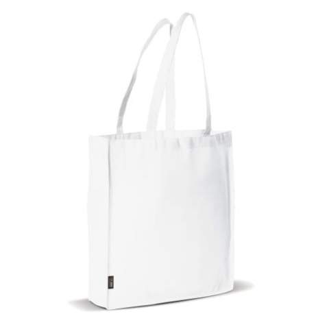 Non-woven draagtas met lange hengsels zodat deze ook als schoudertas gebruikt kan worden. Groot drukoppervlak.