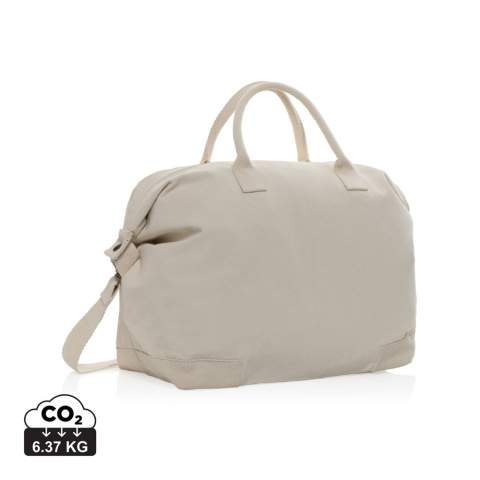 Diese luxuriöse Wochenendtasche ist eine stilvolle und umweltfreundliche Option aus 500g/m² recyceltem Canvas. Sie hat schöne Details, Messingbeschläge und ein geräumiges Hauptfach. Perfekt für alle, die eine hochwertige, umweltfreundliche Reisetasche suchen. Mit AWARE™-Tracer, der die tatsächliche Verwendung von recycelter Baumwolle bestätigt. 2% des Erlöses jedes verkauften Impact-Produkts werden an Water.org gespendet.<br /><br />PVC free: true