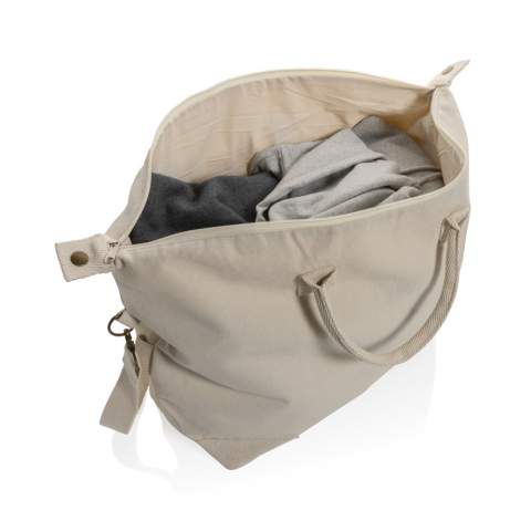 Diese luxuriöse Wochenendtasche ist eine stilvolle und umweltfreundliche Option aus 500g/m² recyceltem Canvas. Sie hat schöne Details, Messingbeschläge und ein geräumiges Hauptfach. Perfekt für alle, die eine hochwertige, umweltfreundliche Reisetasche suchen. Mit AWARE™-Tracer, der die tatsächliche Verwendung von recycelter Baumwolle bestätigt. 2% des Erlöses jedes verkauften Impact-Produkts werden an Water.org gespendet.<br /><br />PVC free: true
