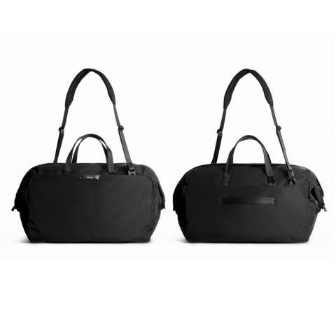 Easy to pack, easy to love. This spacious, uncluttered duffel lets you leave work behind for leisurely weekend adventures. Snap-down ends allow wide-mouth packing. External quick-access pocket with key clip. Internal slip pockets for smaller items. Raised mesh zip pocket for valuables. Strong, rolled-edge webbing handles. Grab loops at each end. Detachable padded shoulder strap.