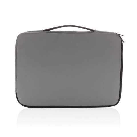 This smooth PU 15.6 inch laptop sleeve is sleek looking and more spacious than you would expect. The laptop sleeve fits a 15.6" laptop. On the front you will find multiple zippered pockets that you can use to put away your laptop accessories and notebook. On the top you will find a handle for easy carrying. Exterior 100% PU. Interior 100% 210D polyester. PVC free.<br /><br />FitsLaptopTabletSizeInches: 15.6<br />PVC free: true