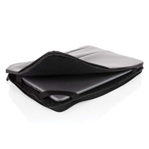This smooth PU 15.6 inch laptop sleeve is sleek looking and more spacious than you would expect. The laptop sleeve fits a 15.6" laptop. On the front you will find multiple zippered pockets that you can use to put away your laptop accessories and notebook. On the top you will find a handle for easy carrying. Exterior 100% PU. Interior 100% 210D polyester. PVC free.<br /><br />FitsLaptopTabletSizeInches: 15.6<br />PVC free: true