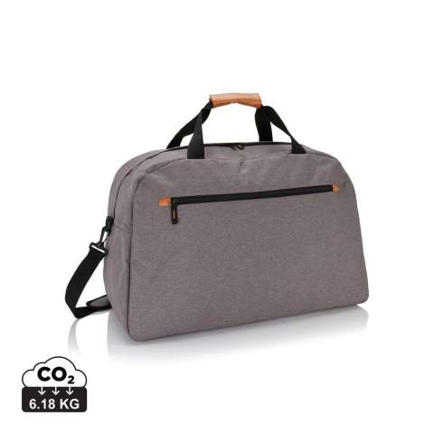 600D 2 tone polyester travel bag with fashionable brown details on the handles and zippers.<br /><br />PVC free: true