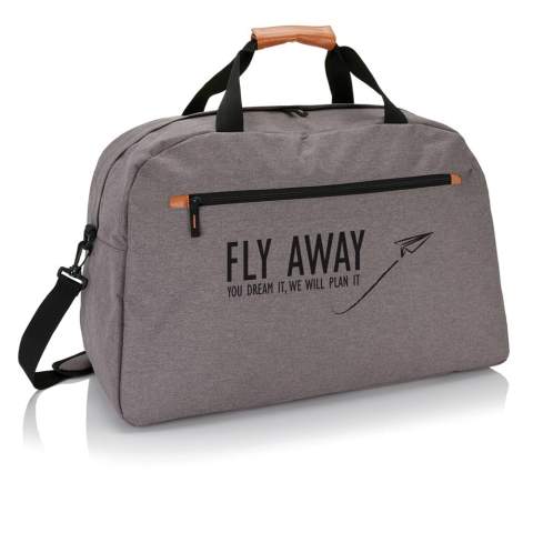 600D 2 tone polyester travel bag with fashionable brown details on the handles and zippers.<br /><br />PVC free: true