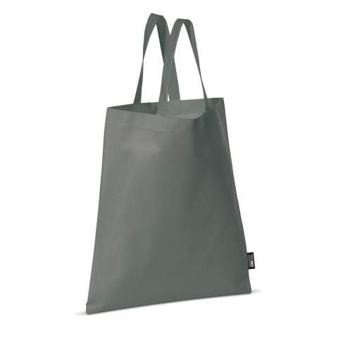 Farbige Non-Woven Tragetasche mit kurzen Griffen. Große Druckfläche.