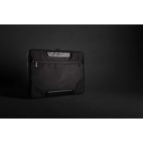 This sleek Swiss Peak AWARE™ RPET Voyager  15.6" laptop sleeve is the ideal accessory for bringing your laptop to work in style. Made with durable recycled 1680D recycled polyester and rich PU details. Features convenient front zipper pocket.  The exterior is made with 1680D polyester and PU details, the lining is made with 150D recycled polyester. With AWARE™ tracer that validates the genuine use of recycled materials. Each bag saves 9.8 litres of water and has reused 16.38 0.5L PET bottles. 2% of proceeds of each product sold containing AWARE™  will be donated to Water.org.<br /><br />FitsLaptopTabletSizeInches: 15.6<br />PVC free: true