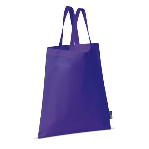 Farbige Non-Woven Tragetasche mit kurzen Griffen. Große Druckfläche.