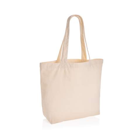 The Impact AWARE™ 240gsm recycled canvas shopper with pocket undyed is the perfect way to carry your essentials wherever you go. This spacious shopper provides sufficient space for all your daily needs. Including a small inner pocket. The recycled canvas is undyed and used in its raw form, without chemicals from dyeing or bleaching. With AWARE™ tracer that validates the genuine use of recycled materials. 2% of proceeds of each Impact product sold will be donated to Water.org. Composition 70% recycled cotton, 30% recycled polyester.<br /><br />PVC free: true