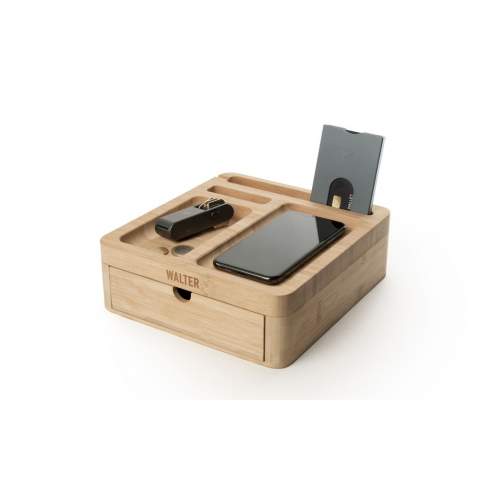 Desk organizer and wireless 15W phone charger in one, with cable with USB-C connector. This desk accessory is made of sustainable bamboo. The built-in magnetic wireless fast charger is compatible with all devices that support Qi wireless charging. Give this organizer a permanent place on your desk and collect your coins, paper clips, stationery, glasses, keys or your wallet. This way, your desk is tidy and all important things are clearly arranged. With drawer as extra storage space. Includes user manual. Each item is supplied in an individual brown cardboard box.