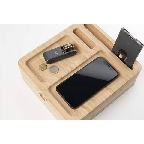 Desk organizer and wireless 15W phone charger in one, with cable with USB-C connector. This desk accessory is made of sustainable bamboo. The built-in magnetic wireless fast charger is compatible with all devices that support Qi wireless charging. Give this organizer a permanent place on your desk and collect your coins, paper clips, stationery, glasses, keys or your wallet. This way, your desk is tidy and all important things are clearly arranged. With drawer as extra storage space. Includes user manual. Each item is supplied in an individual brown cardboard box.
