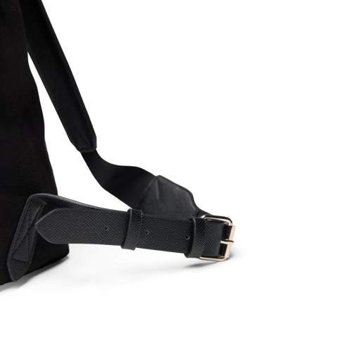 An elegant backpack suitable for any occasion. The backpack is made from recycled faux leather and PU details, adding style while you're on the go. A buckle and magnetic closure provide smooth and secure fastening. The exterior also features a practical outer pocket and a reinforced bottom. The wide opening allows easy access to your belongings, with an inner compartment for a laptop and a smaller zippered pocket for organised storage. Certified by RCS (Recycled Claim Standard), which ensures that the entire supply chain of recycled materials is certified. The total percentage of recycled material is based on the product’s total weight. This product contains 44% RCS-certified recycled polyester and 5% RCS-certified recycled PU.<br /><br />FitsLaptopTabletSizeInches: 15.0