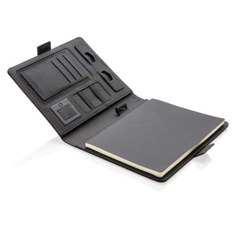 This notebook cover with removable notebook (128 lined pages of 80 gsm) boasts the latest technology. The front cover has a wireless charging pad for your phone. (Android latest generations, iPhone 8 and up). Older phones and tablets can be charged via the USB ports from the 4.000 mAh powerbank. The unique USB ports pop up with a simple click of a button.  Input: 5.0V/1.0A. Output: 5.0V/2.1A. Wireless Output: 5W. Registered design®<br /><br />NotebookFormat: A5<br />WirelessCharging: true<br />PowerbankCapacity: 4000<br />NumberOfPages: 128<br />PaperRulingLayout: Lined pages